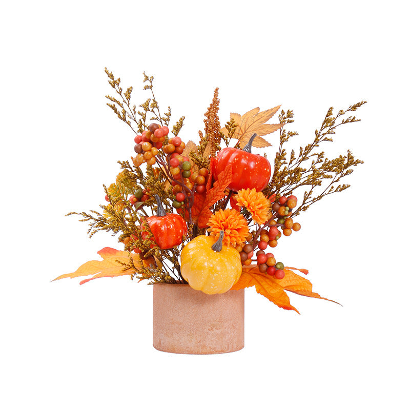 Décoration d'automne, feuilles et citrouille en pot